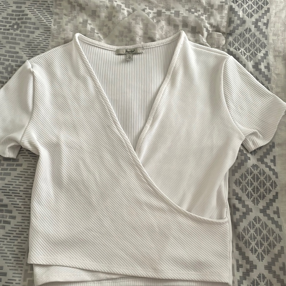 Thick white crop top with deep v neck